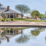 Lounge chairs on the beach by the lake